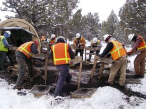 Archaelogists screening in Pacific Northwest snow